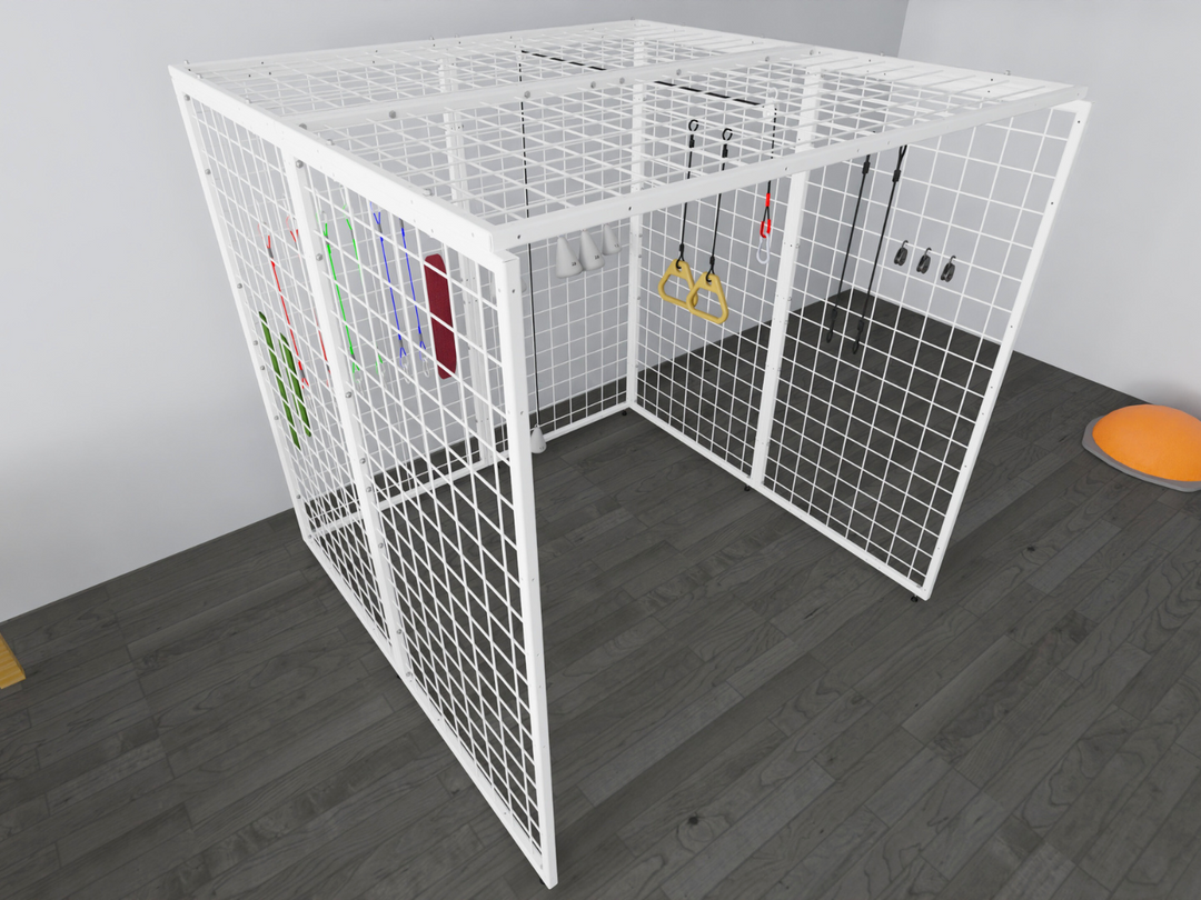 Image of the Summit Sensory Gym Universal Exercise Unit, also referred to as a Spider Cage, featuring a robust white metal grid frame. The unit is equipped with various therapy tools, including colorful resistance bands, yellow handles, and ropes, arranged within the structure. The cage is positioned on a sleek, dark wood-style floor, with an orange therapy balance dome visible in the background.